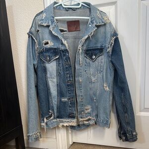 Ripped denim jacket